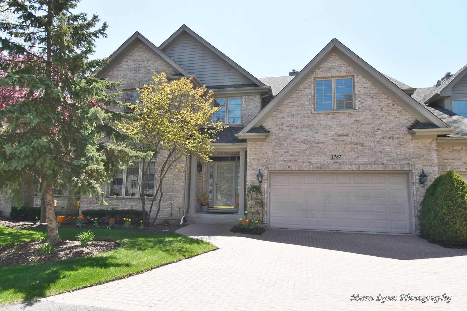 a front view of house with yard
