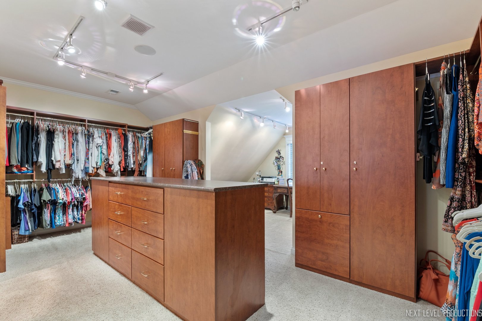 1787 Rizzi Lane Bartlett, IL 60103 - Photo 24 of 47 an empty room with lots of wooden cabinets