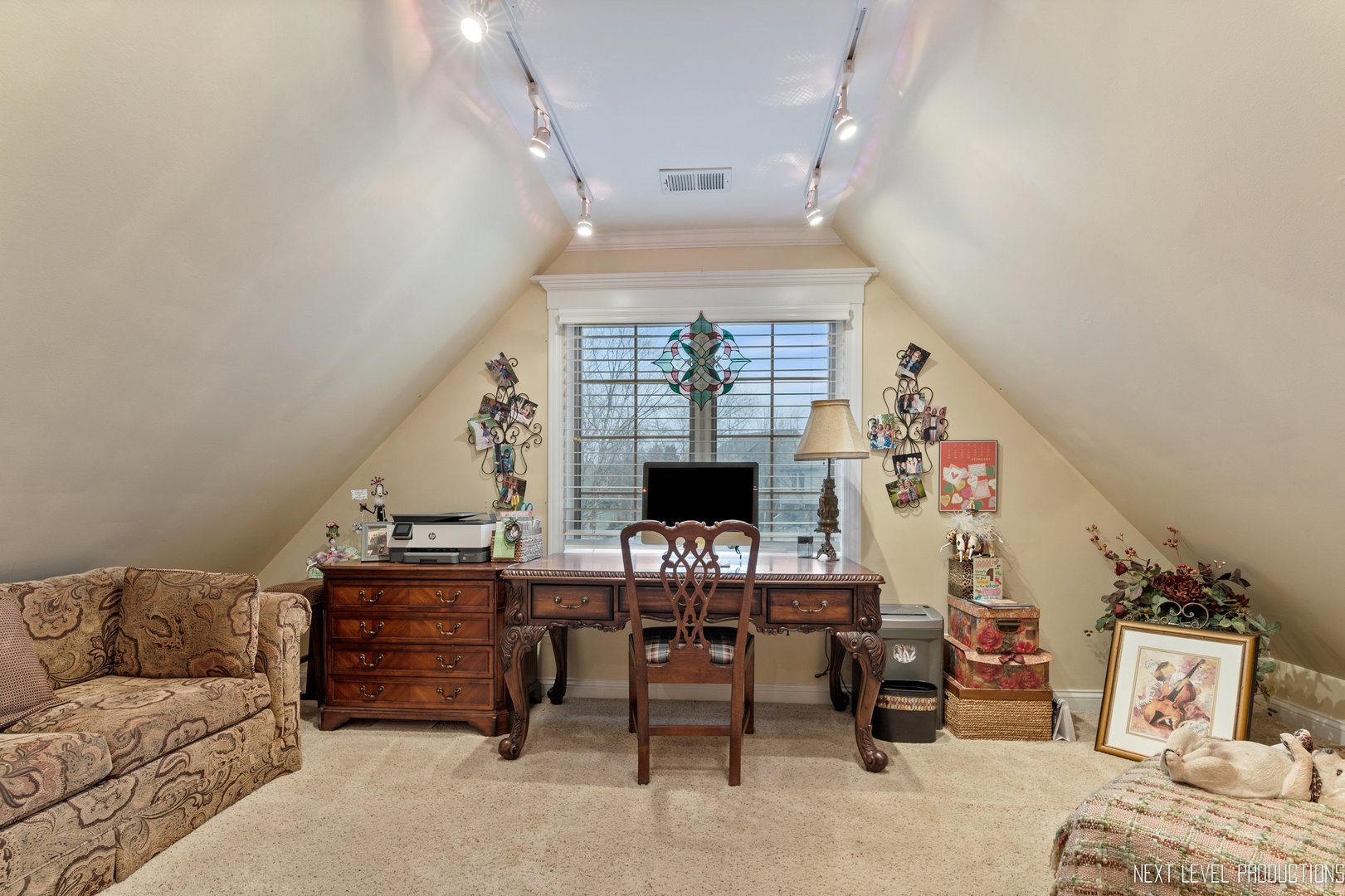 1787 Rizzi Lane Bartlett, IL 60103 - Photo 25 of 47 a living room with furniture and a fireplace
