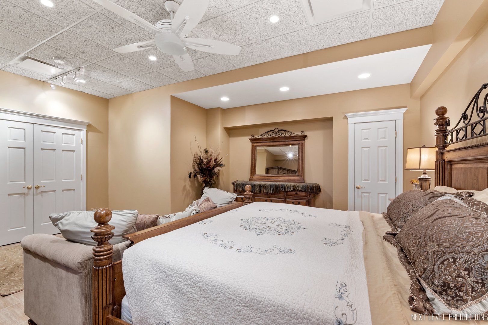 1787 Rizzi Lane Bartlett, IL 60103 - Photo 32 of 47 a bedroom with a bed and a flat screen tv