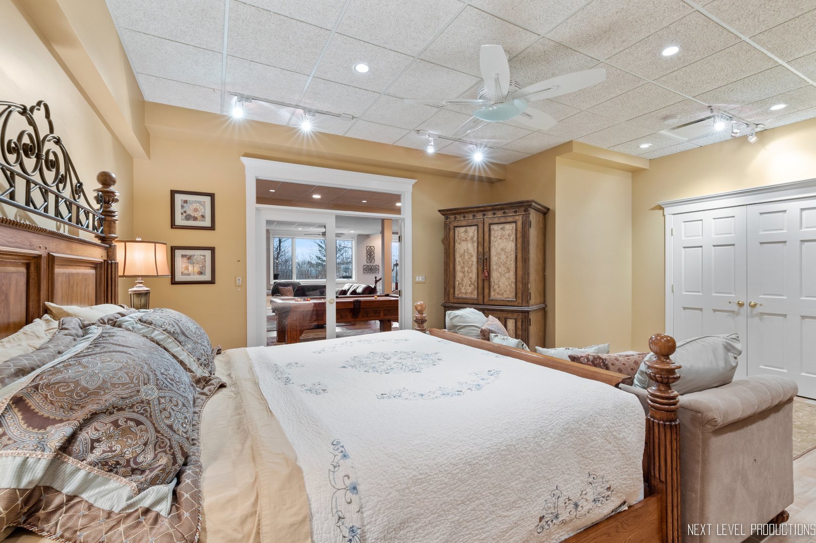 1787 Rizzi Lane Bartlett, IL 60103 - Photo 33 of 47 a bed room with a bed and a large mirror