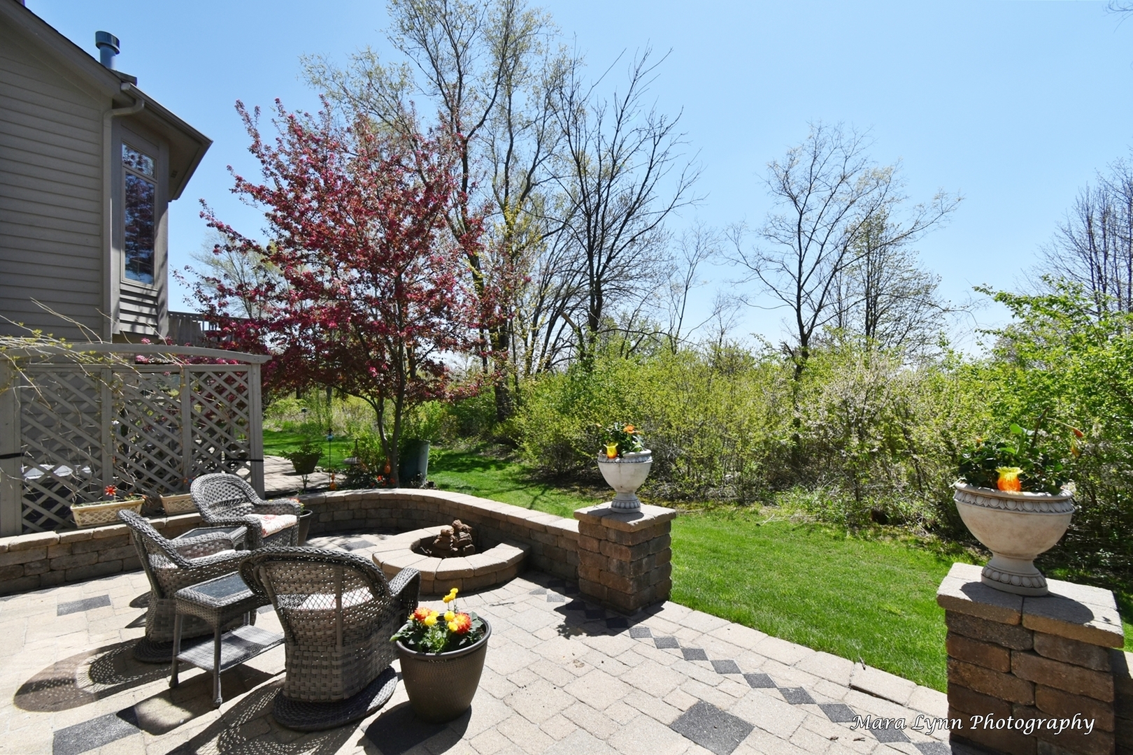 1787 Rizzi Lane Bartlett, IL 60103 - Photo 42 of 47 a view of a patio with table and chairs and potted plants