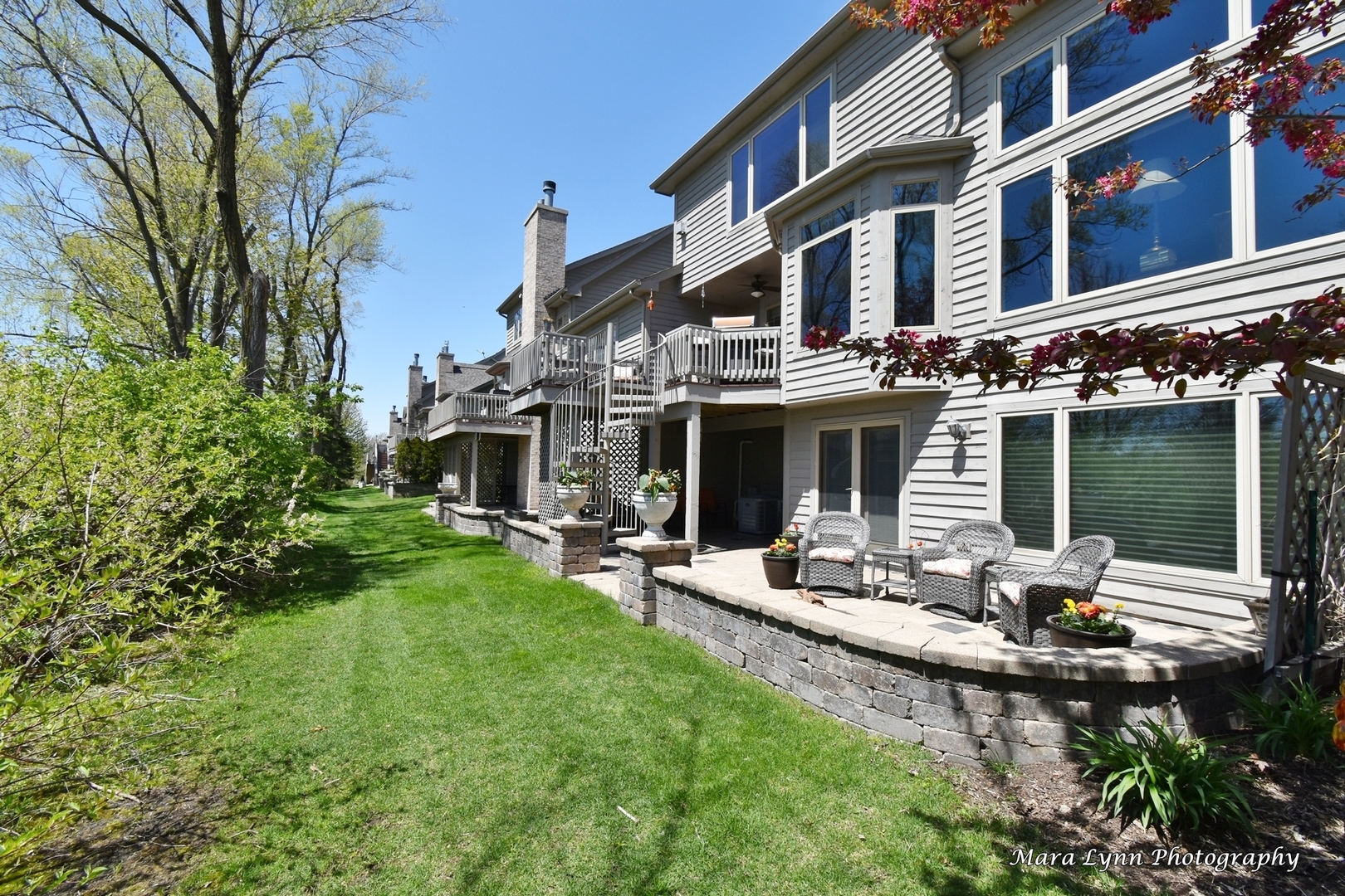 1787 Rizzi Lane Bartlett, IL 60103 - Photo 46 of 47 a view of a house with backyard sitting area and garden