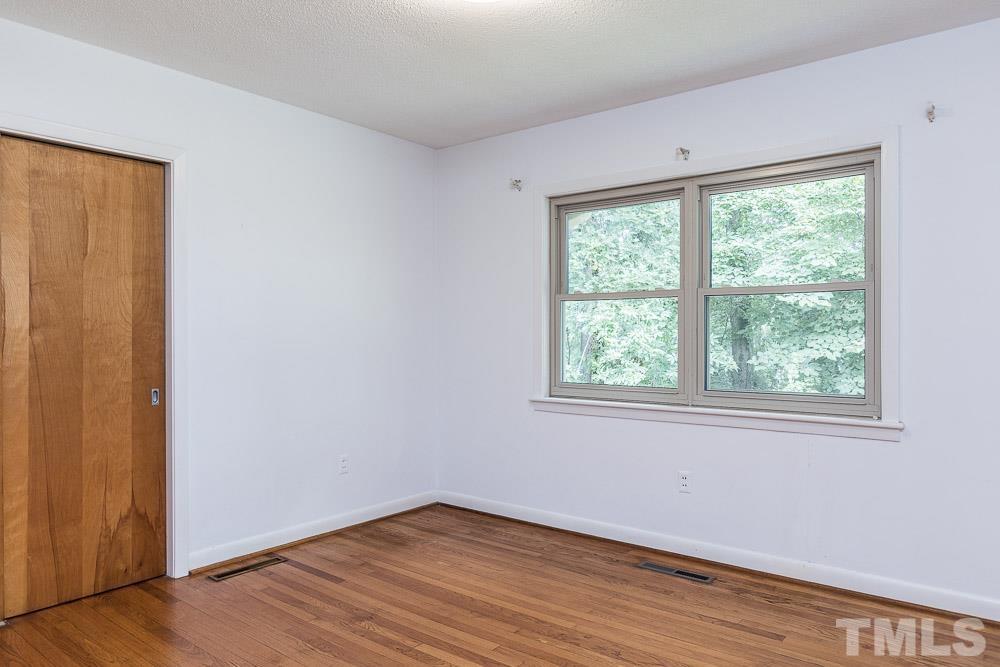 602 Wofford Road Durham, NC 27707 - Photo 7 of 26 Recently used as a den. Could be a dining room or office.