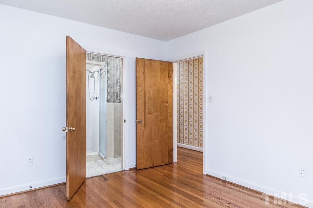 602 Wofford Road Durham, NC 27707 - Photo 8 of 26 Brighten this room with a coat of paint on the paneling. So much better than shiplap!