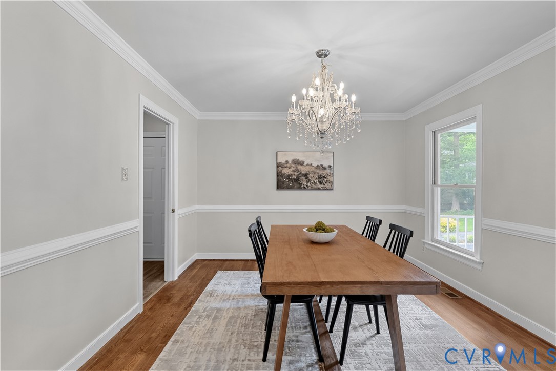 14308 Chimney House Road Midlothian, VA 23112 - Photo 13 of 52 Dining space featuring wood-finish flooring, a cry