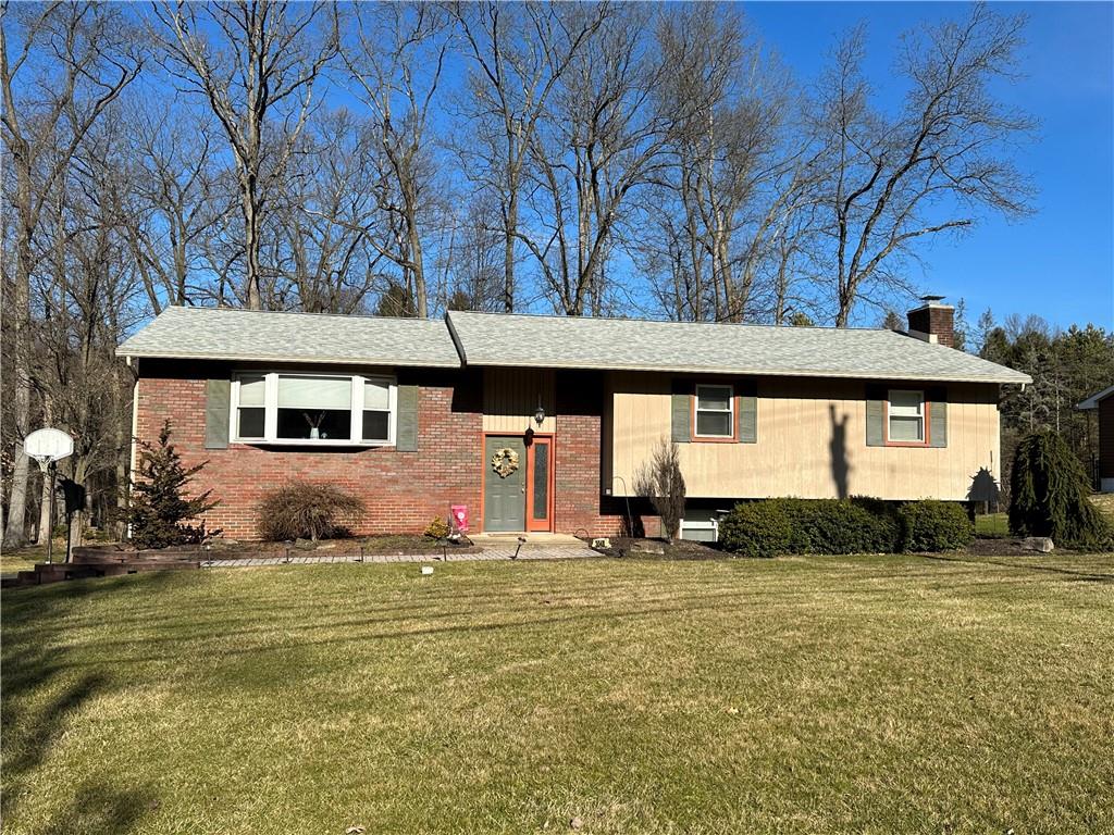 3048 Warren Road Indiana, PA 15701 - Photo 1 of 11 a front view of a house with a yard
