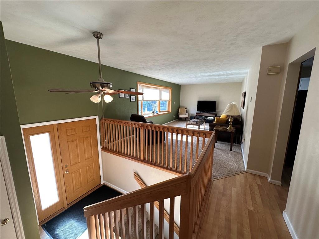 3048 Warren Road Indiana, PA 15701 - Photo 4 of 11 a view of a livingroom with furniture and hardwood floor