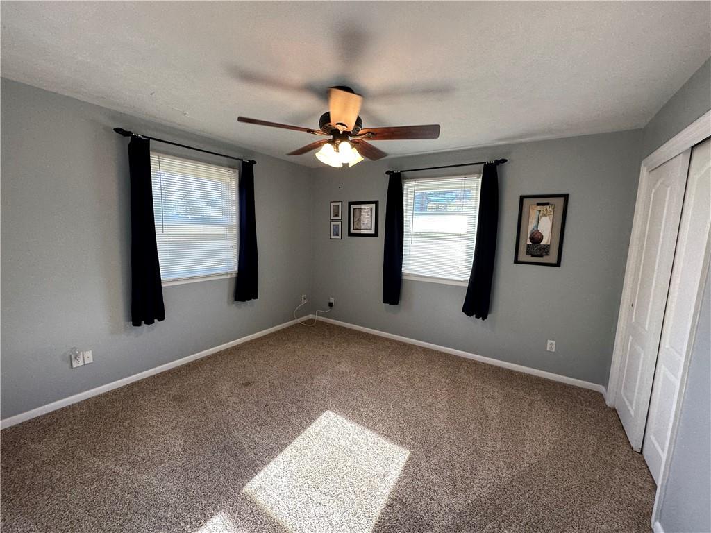 3048 Warren Road Indiana, PA 15701 - Photo 8 of 11 a view of a livingroom with a fan
