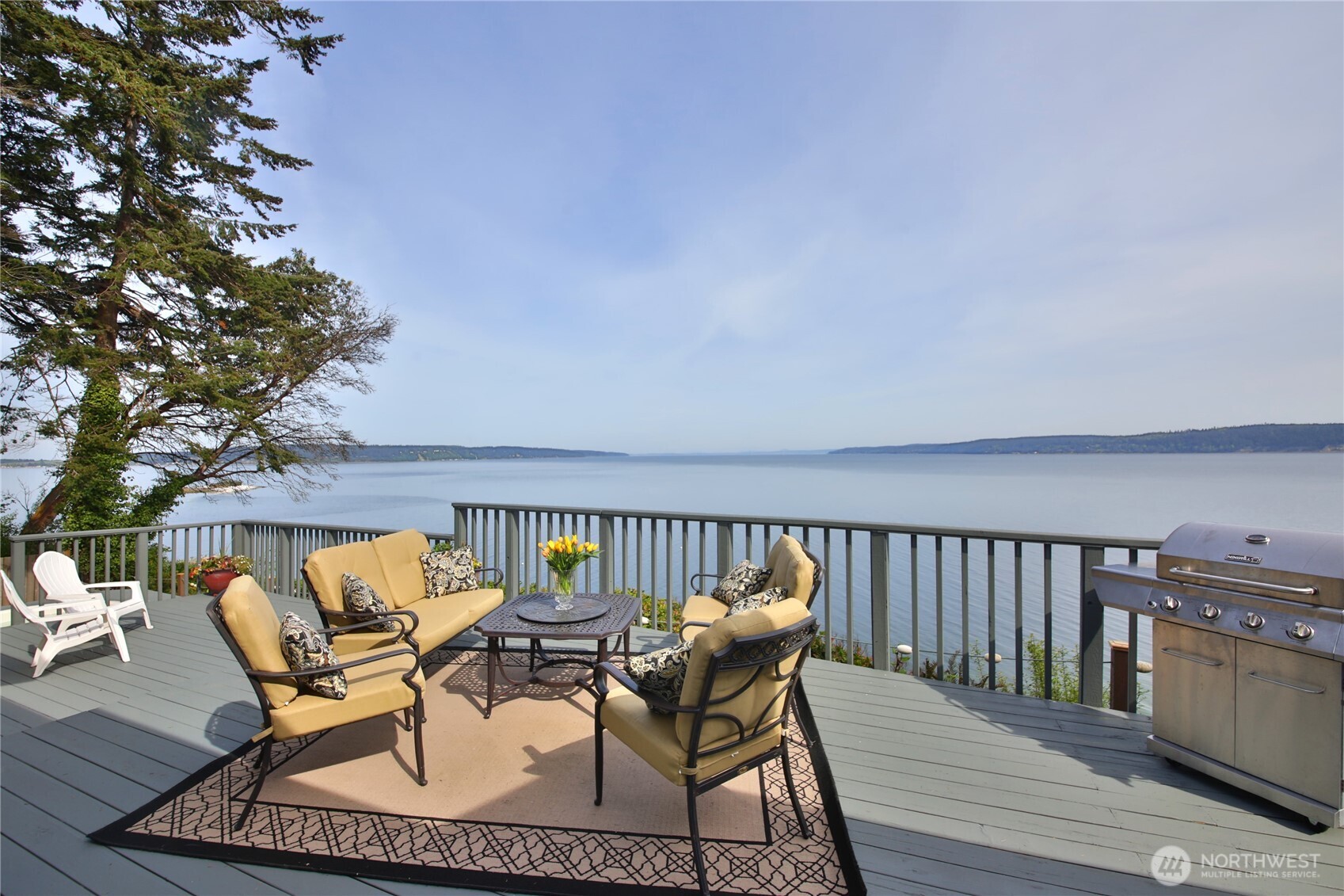 2999 Saratoga Road Langley, WA 98260 - Photo 2 of 40 a view of a chairs and table on the deck