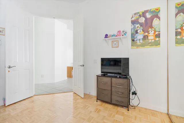 a bathroom with a sink vanity and a mirror