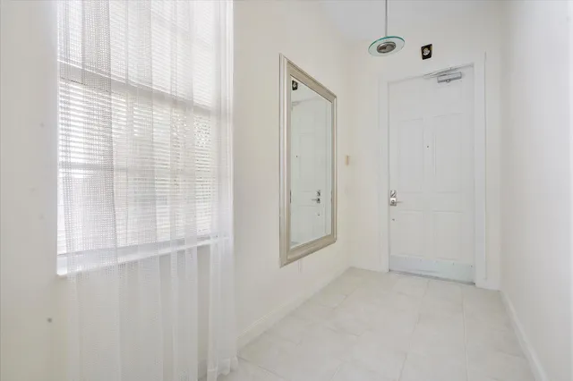 a utility room with sink dryer and washer