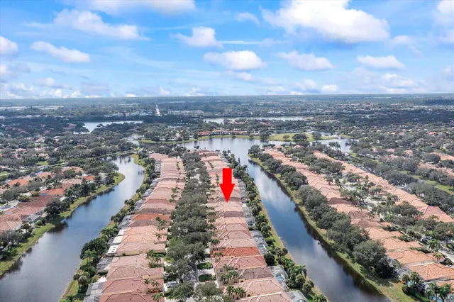 a picture of floor with a large white building