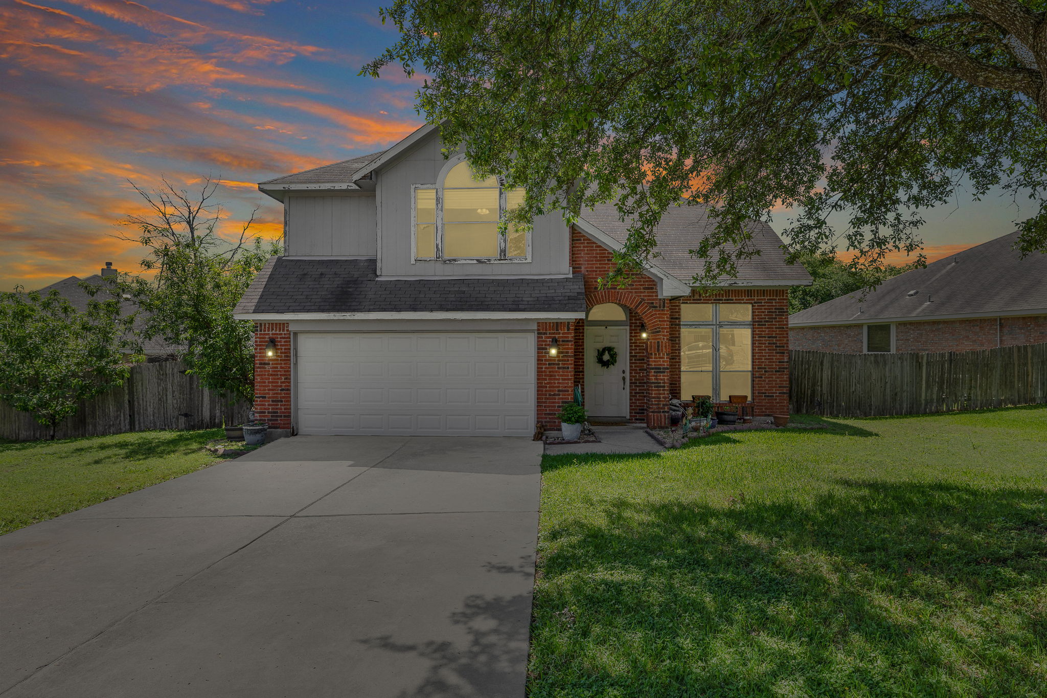 615 Runners Ridge Pflugerville, TX 78660 - Photo 2 of 32 a front view of house with yard and green space