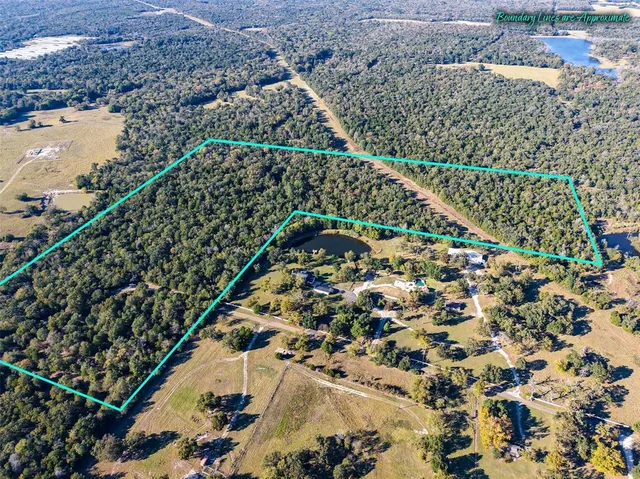 a view of a lake with a yard