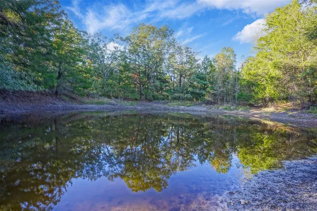 a view of a lake with outdoor space