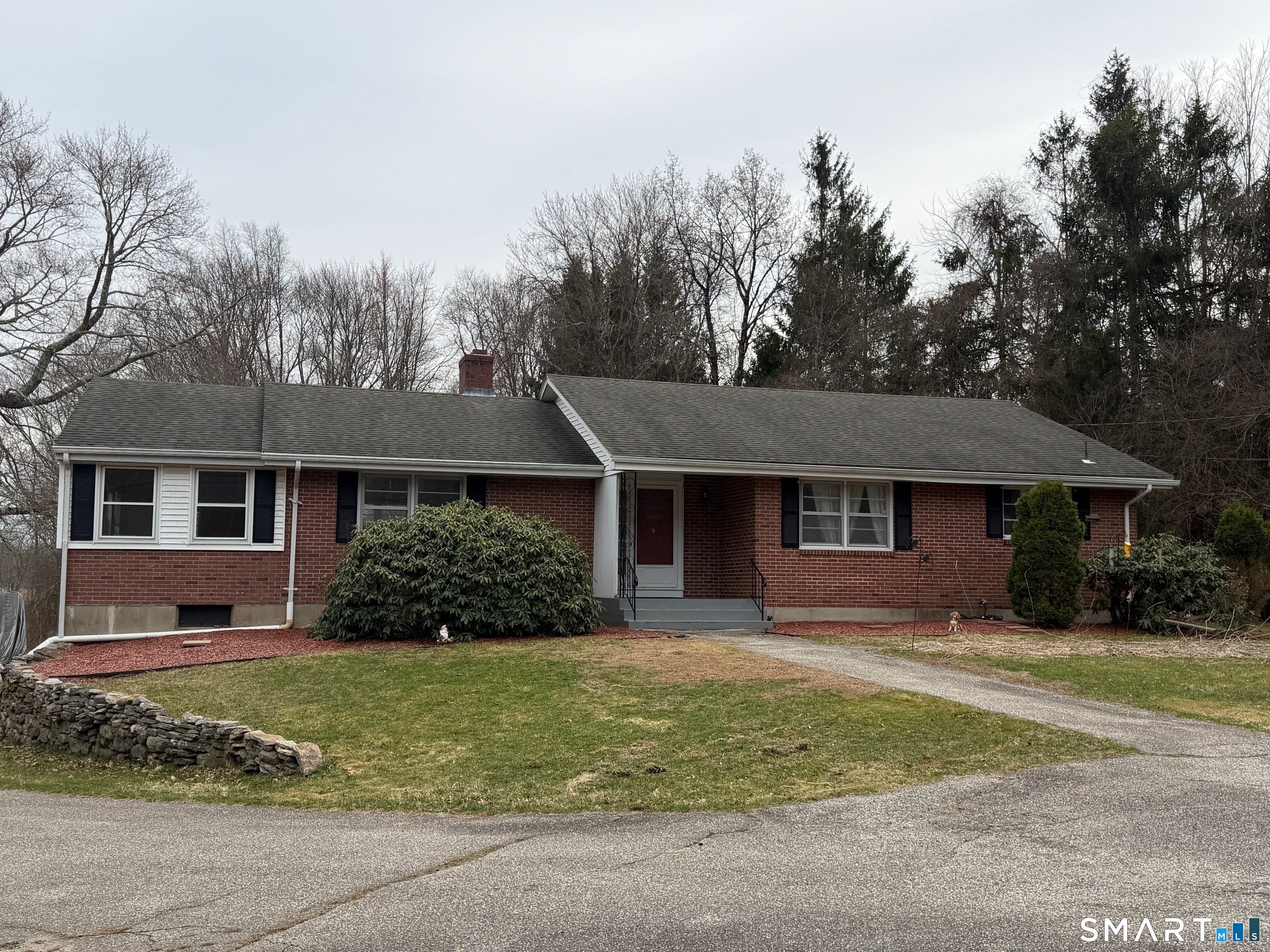 front view of a house with a yard