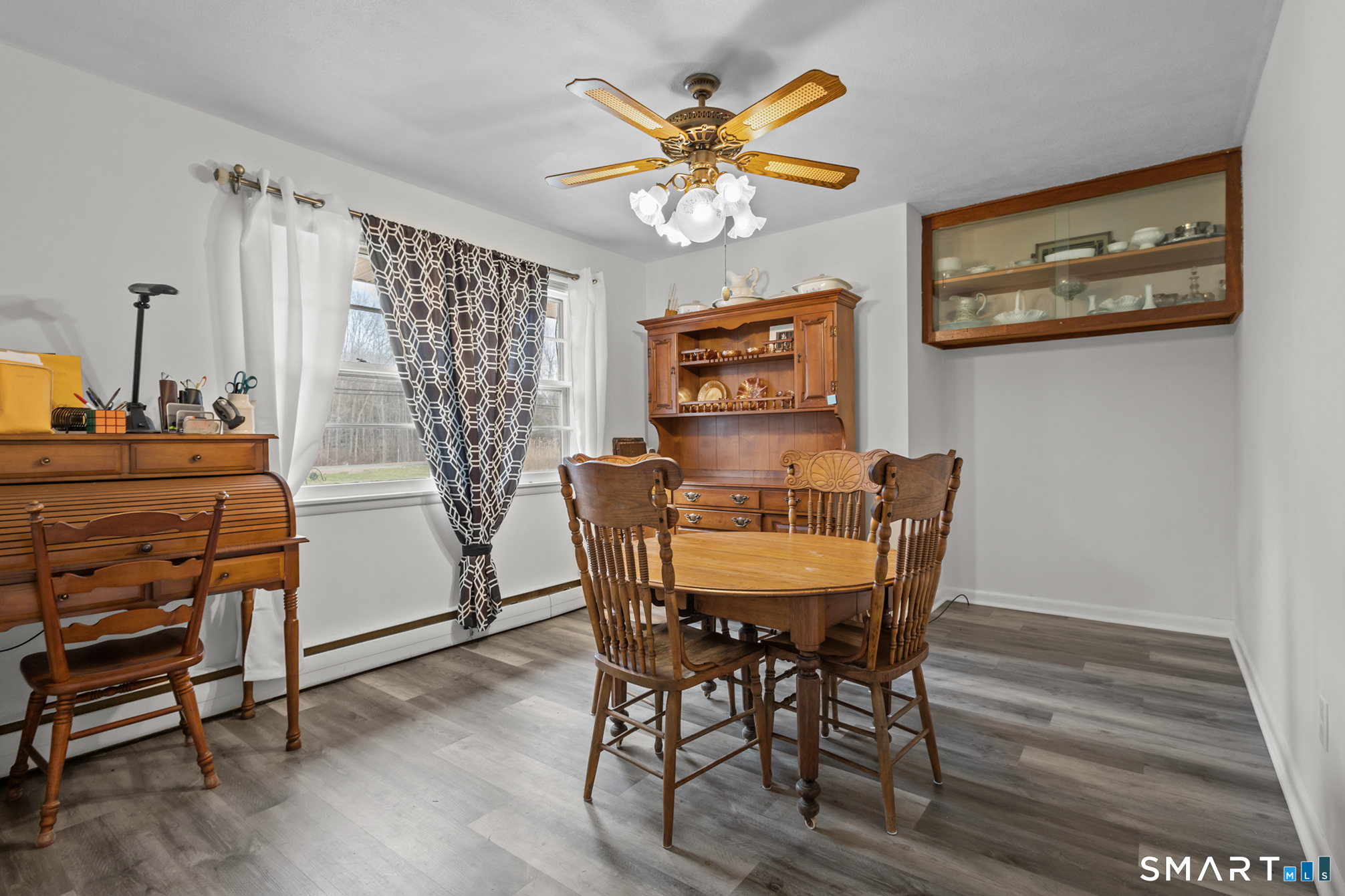 226 Beaumont Highway Lebanon, CT 06249 - Photo 14 of 43 a view of a dining room with furniture and wooden floor