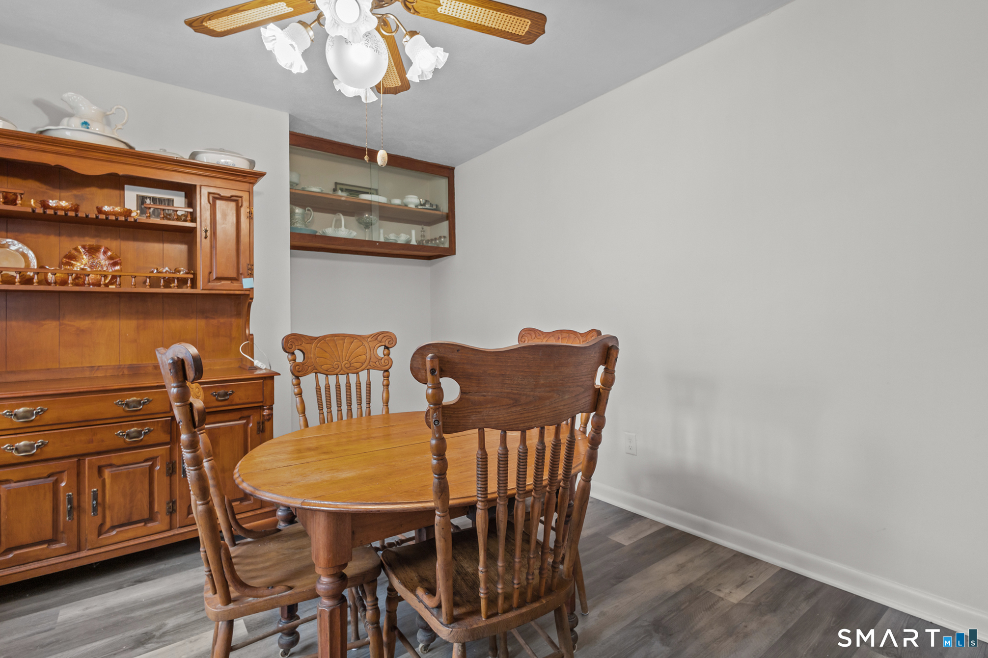 226 Beaumont Highway Lebanon, CT 06249 - Photo 15 of 43 a view of a dining room with furniture and wooden floor