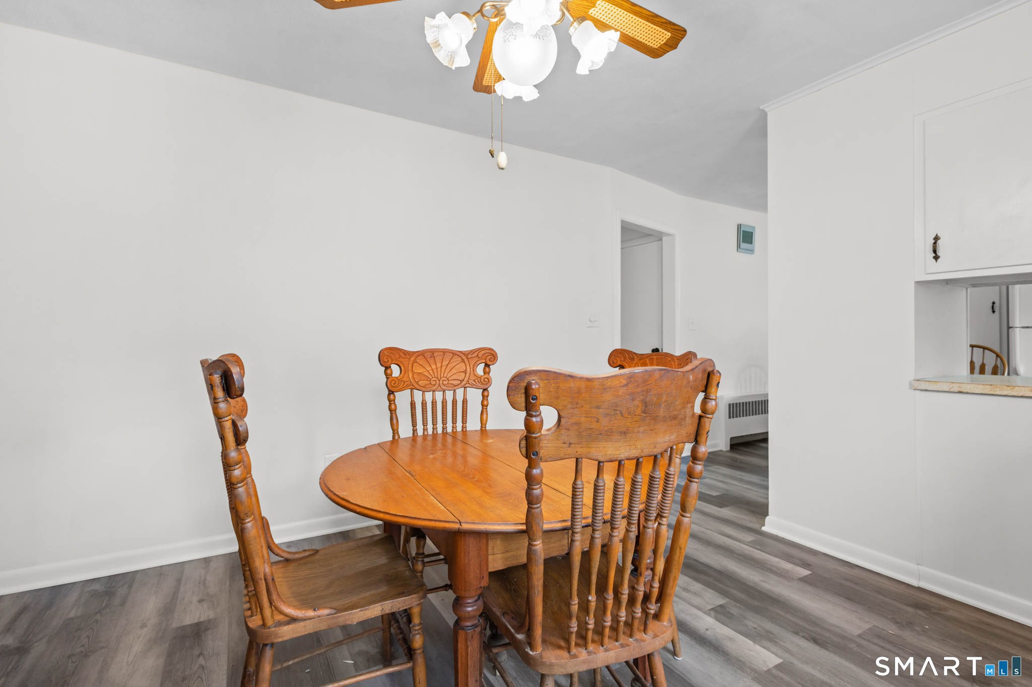 226 Beaumont Highway Lebanon, CT 06249 - Photo 16 of 43 a dining room with furniture and wooden floor