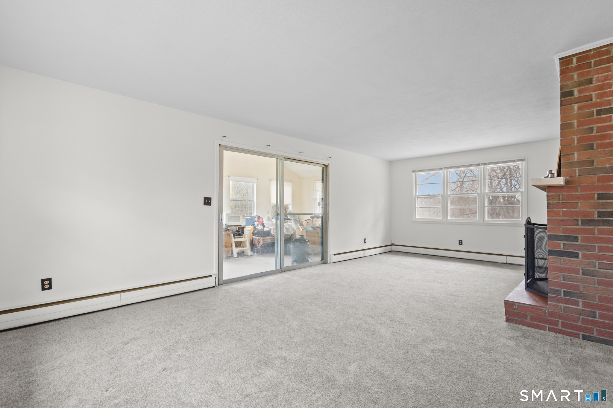 226 Beaumont Highway Lebanon, CT 06249 - Photo 19 of 43 an empty room with windows