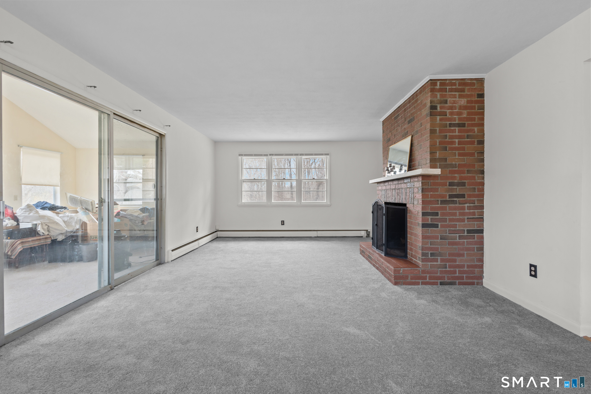 226 Beaumont Highway Lebanon, CT 06249 - Photo 20 of 43 a view of empty room with a fireplace