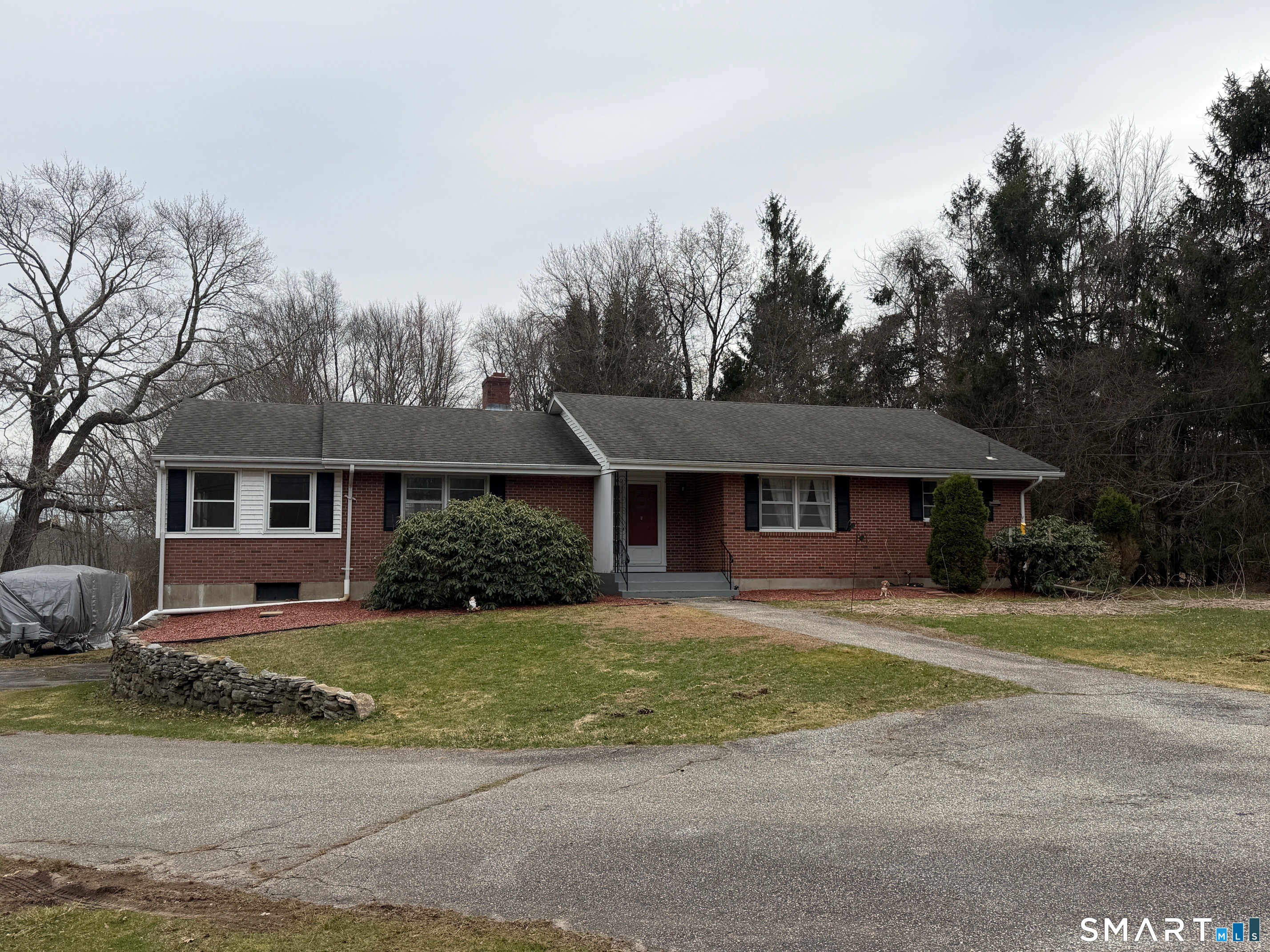 226 Beaumont Highway Lebanon, CT 06249 - Photo 3 of 43 front view of a house with a yard