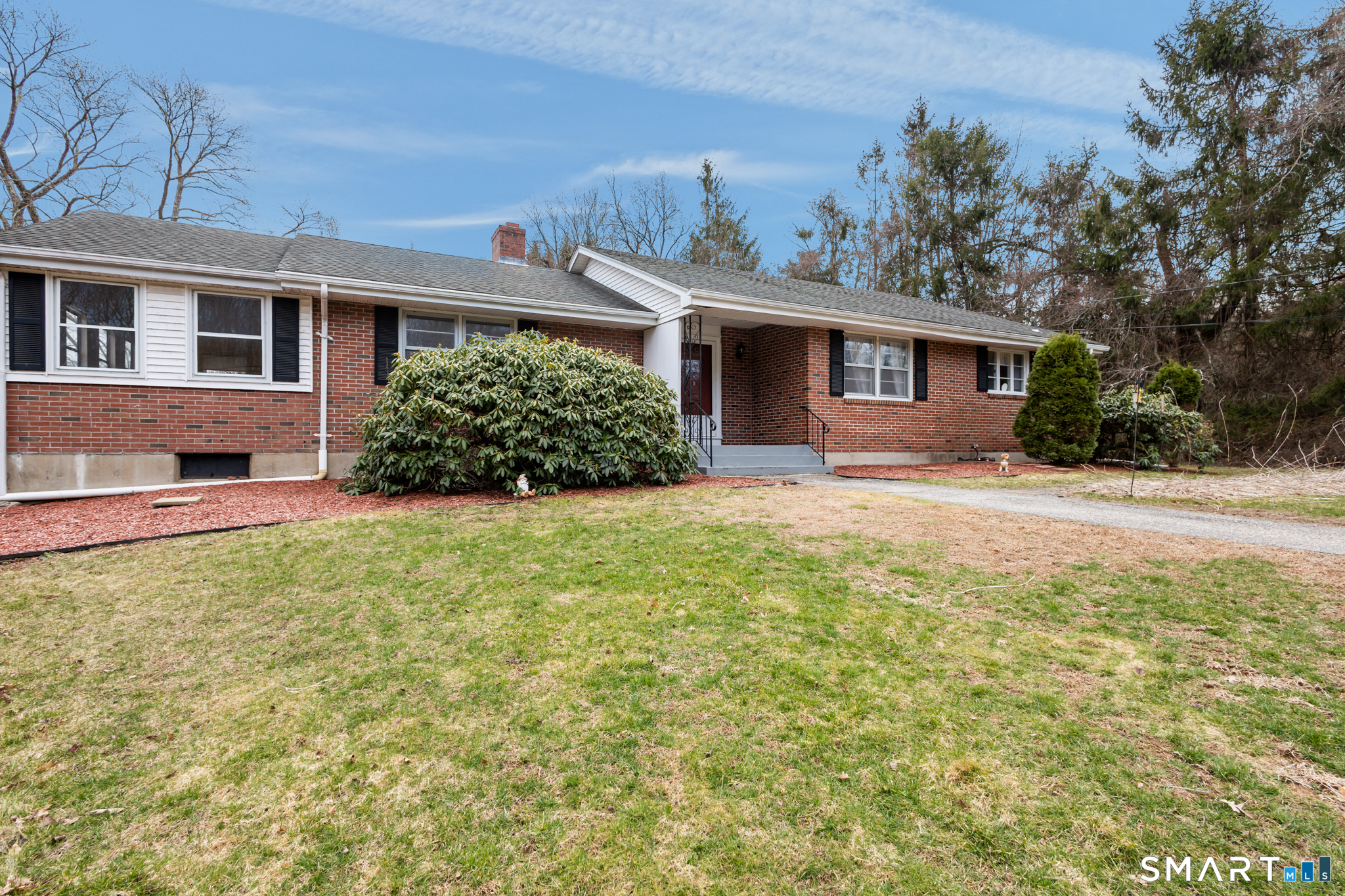 226 Beaumont Highway Lebanon, CT 06249 - Photo 39 of 43 a front view of a house with a yard and potted plants