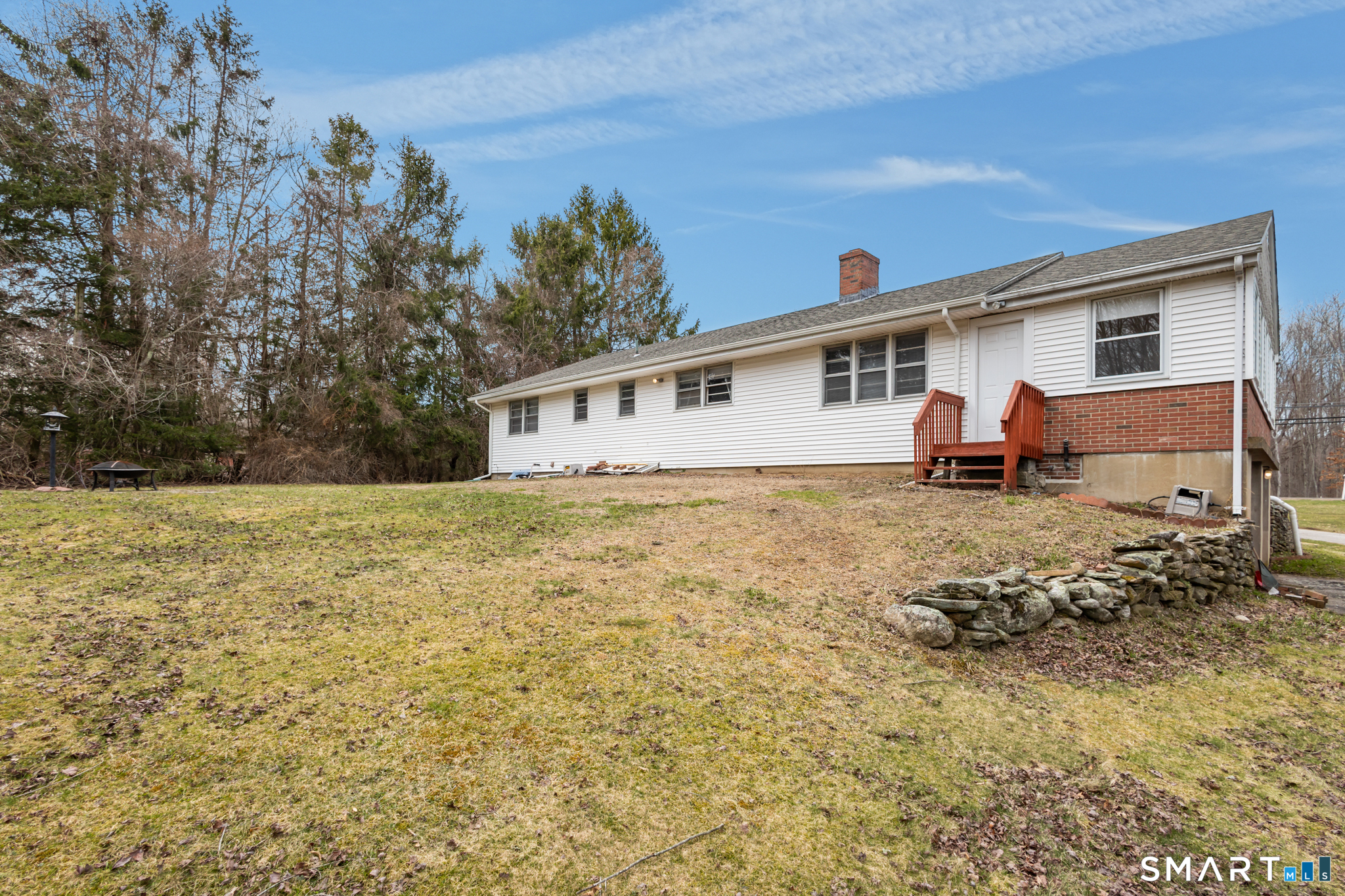 226 Beaumont Highway Lebanon, CT 06249 - Photo 40 of 43 a view of a house with a yard