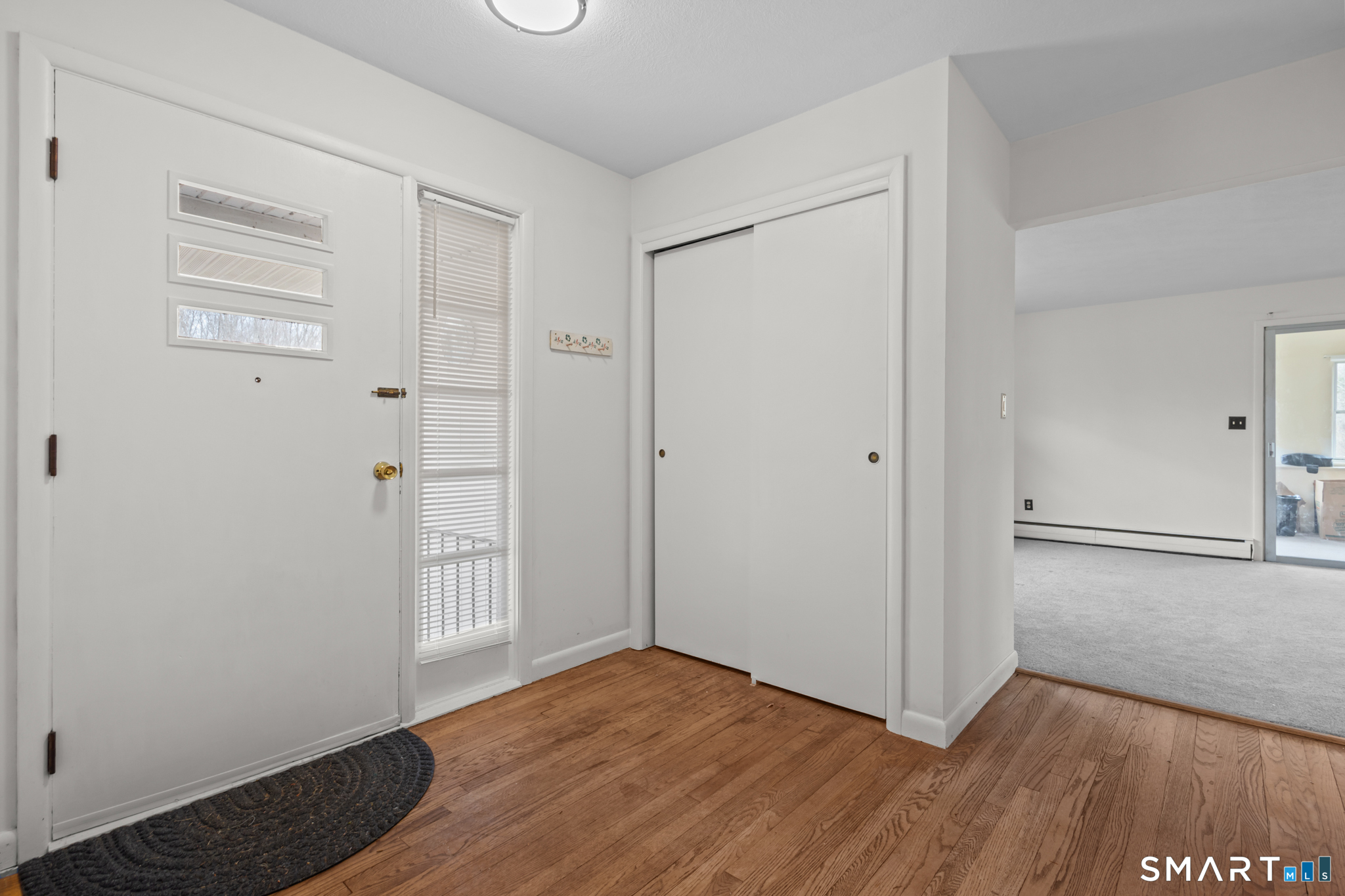 226 Beaumont Highway Lebanon, CT 06249 - Photo 7 of 43 a view of empty room with wooden floor
