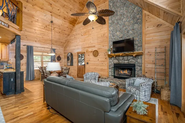a kitchen with a table and chairs in it