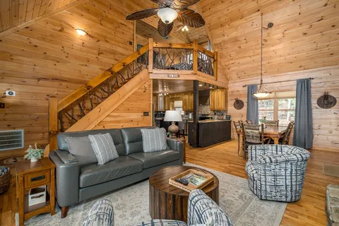 a outdoor space with lots of chairs and a table