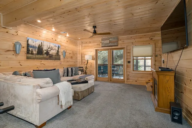 a view of a balcony with furniture