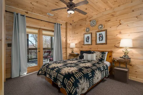 a view of backyard with deck and chair