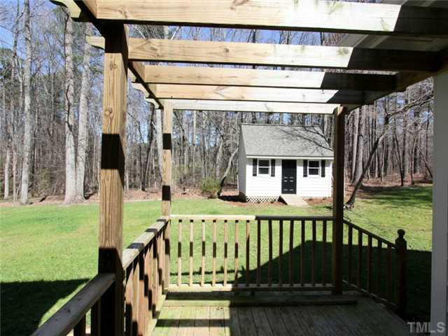 5504 Fallen Leaf Court Raleigh, NC 27606 - Photo 25 of 25 Grilling deck with pergola