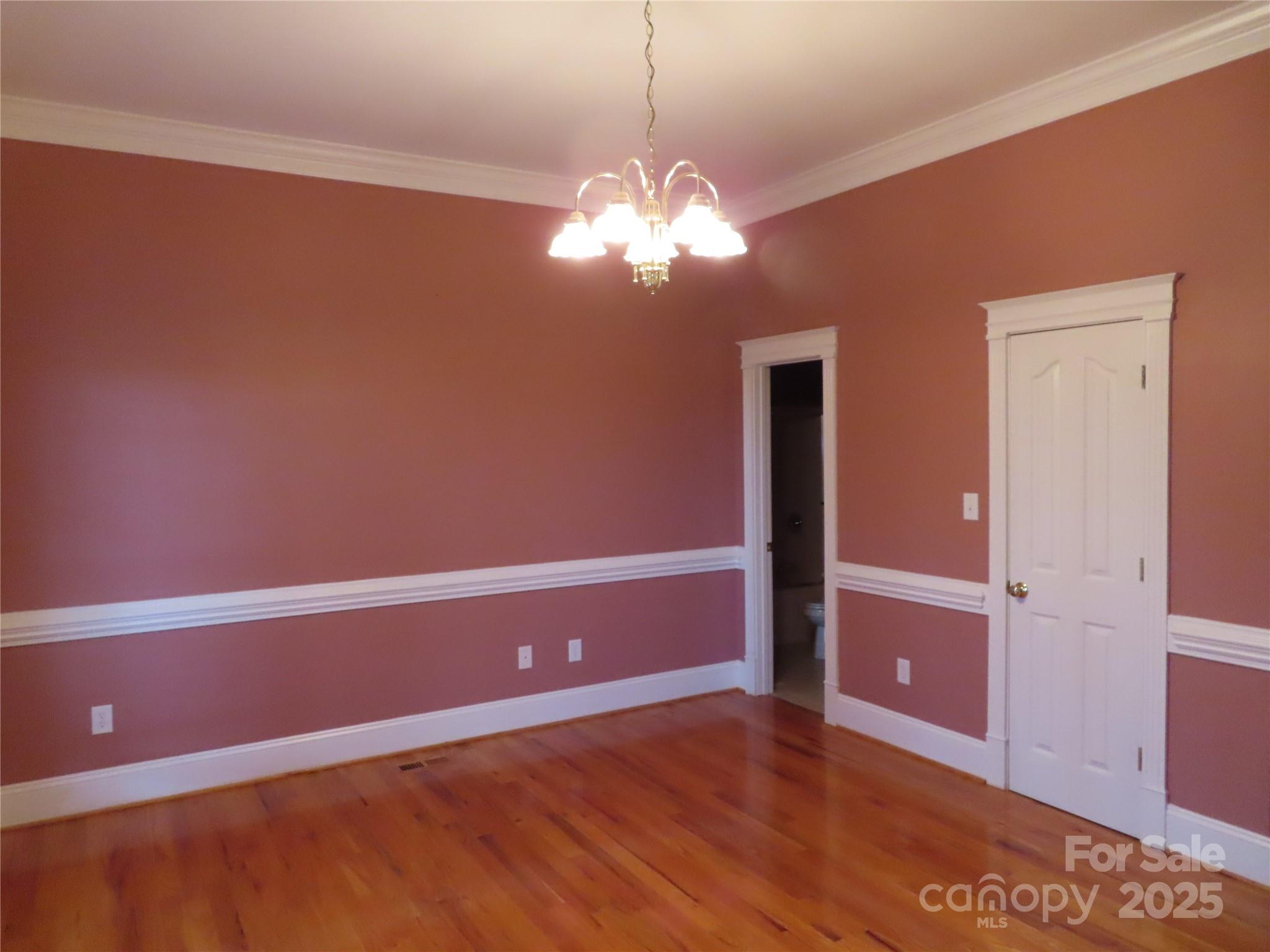 2530 Sharon Road York, SC 29745 - Photo 28 of 41 a view of an empty room with window and wooden floor