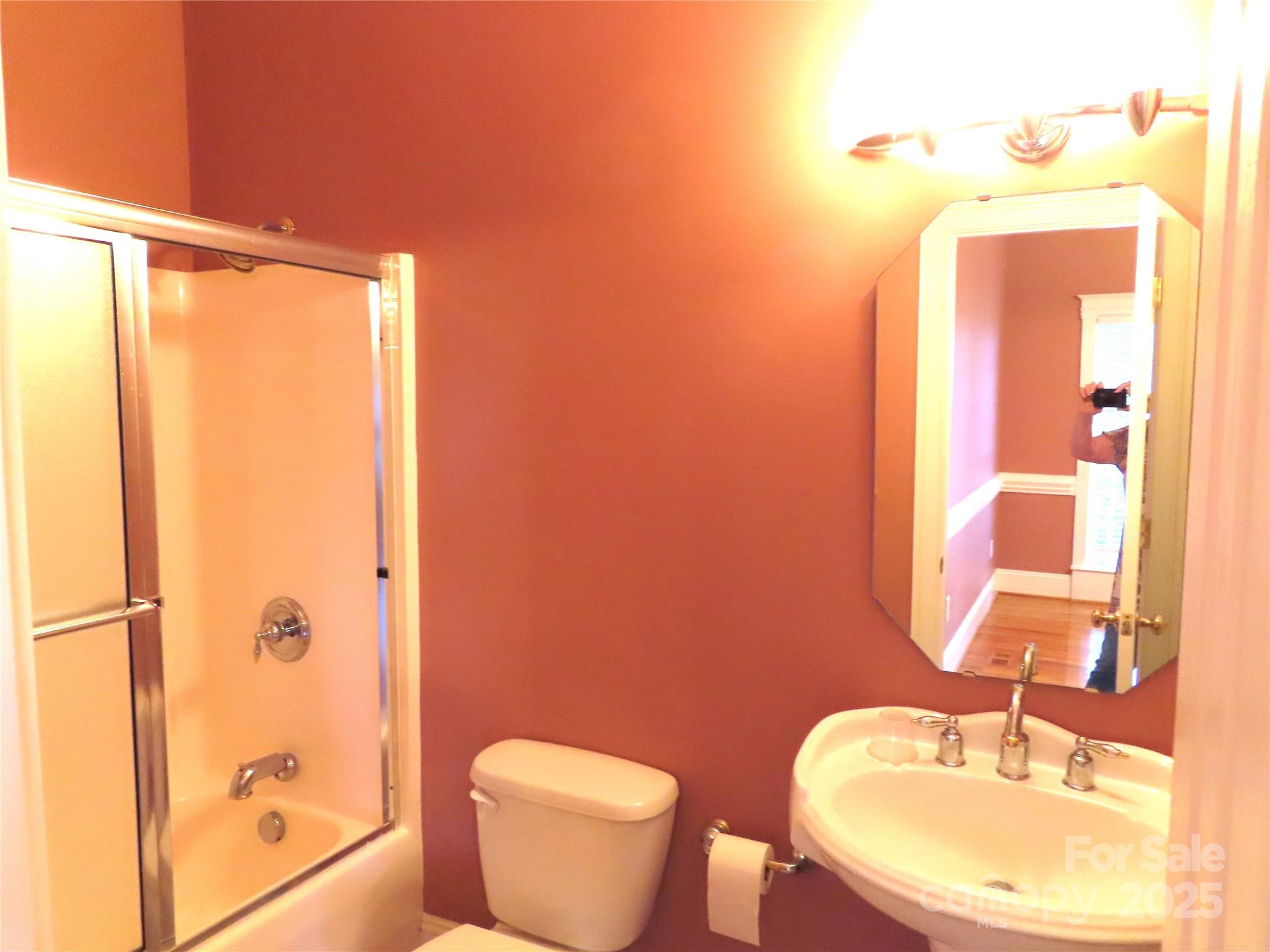 2530 Sharon Road York, SC 29745 - Photo 30 of 41 a bathroom with a toilet a sink and shower