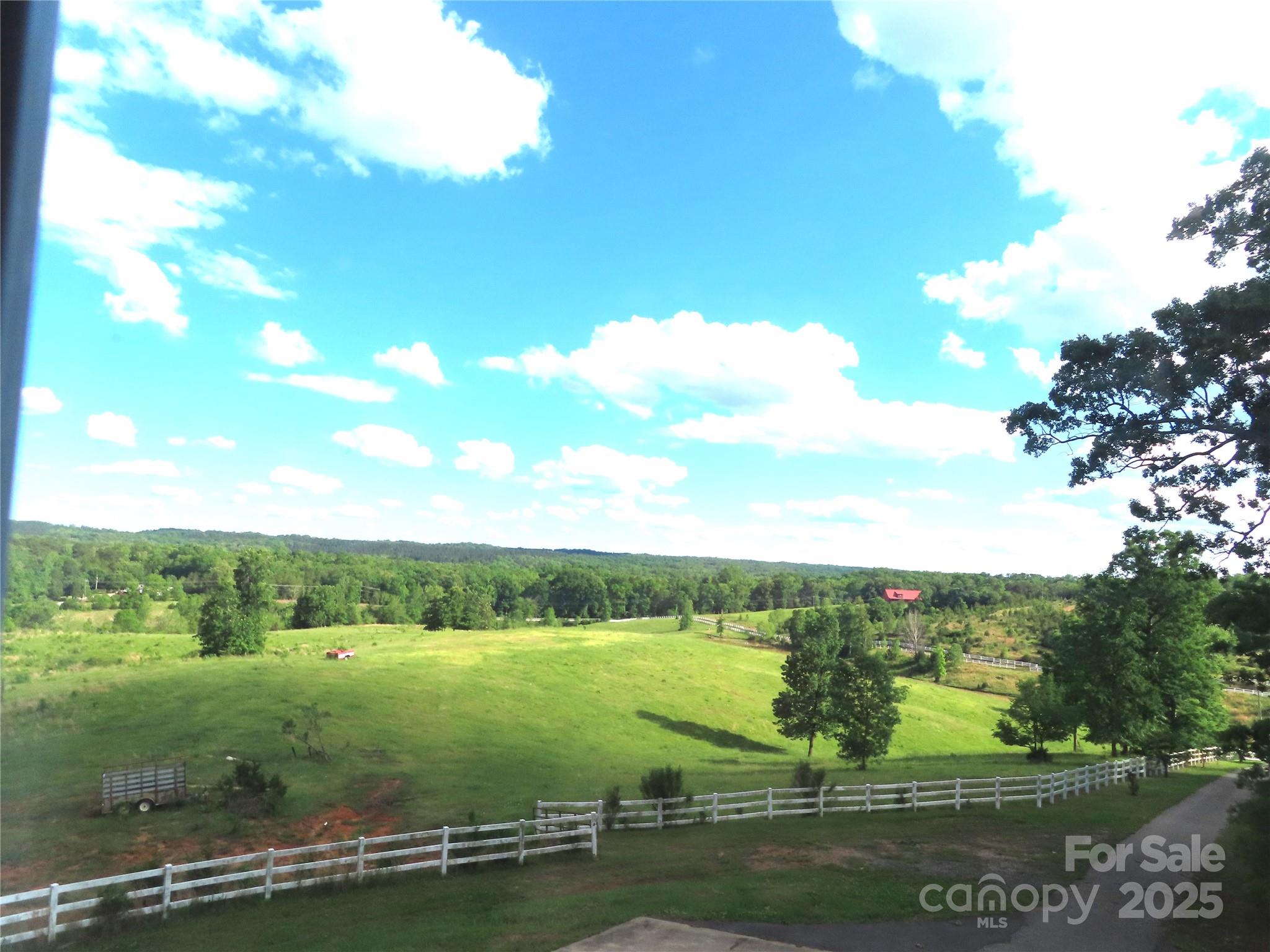 2530 Sharon Road York, SC 29745 - Photo 5 of 41 a view of a lake with a big yard