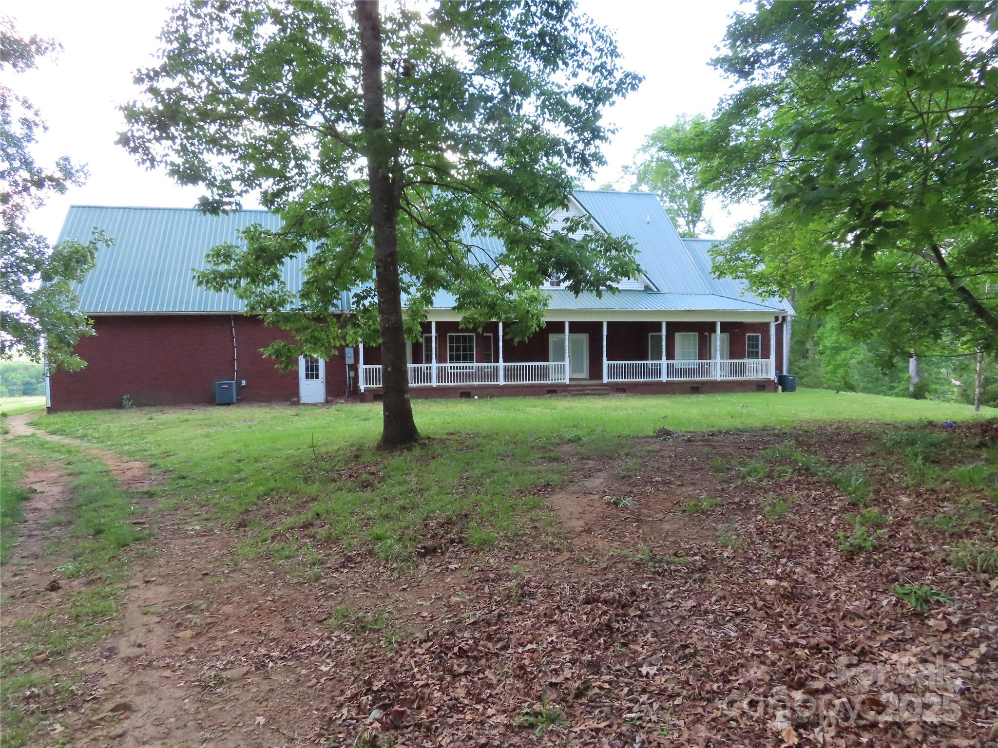 2530 Sharon Road York, SC 29745 - Photo 7 of 41 a front view of a house with yard and green space