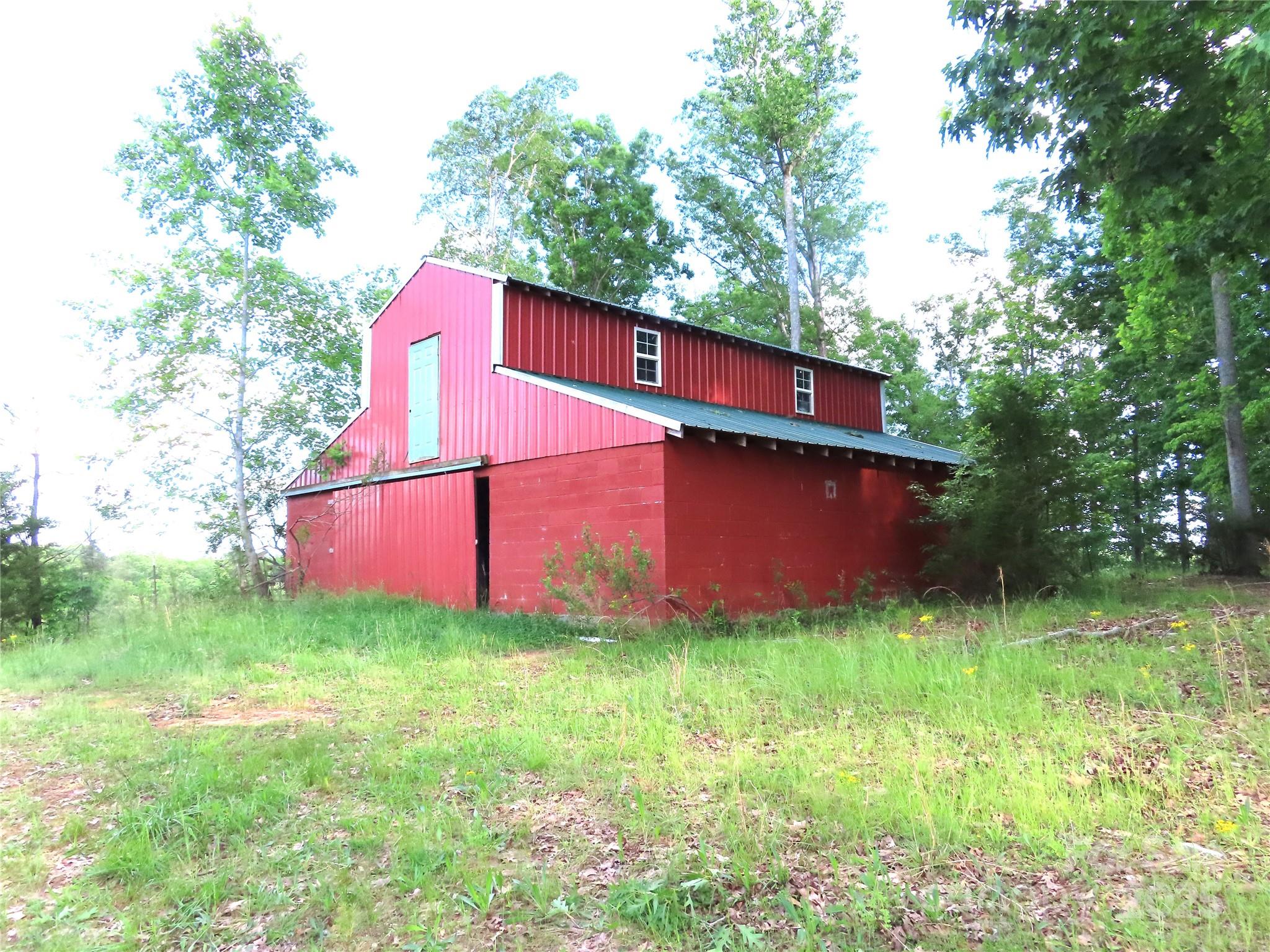 2530 Sharon Road York, SC 29745 - Photo 8 of 41 a backyard of a house with lots of green space