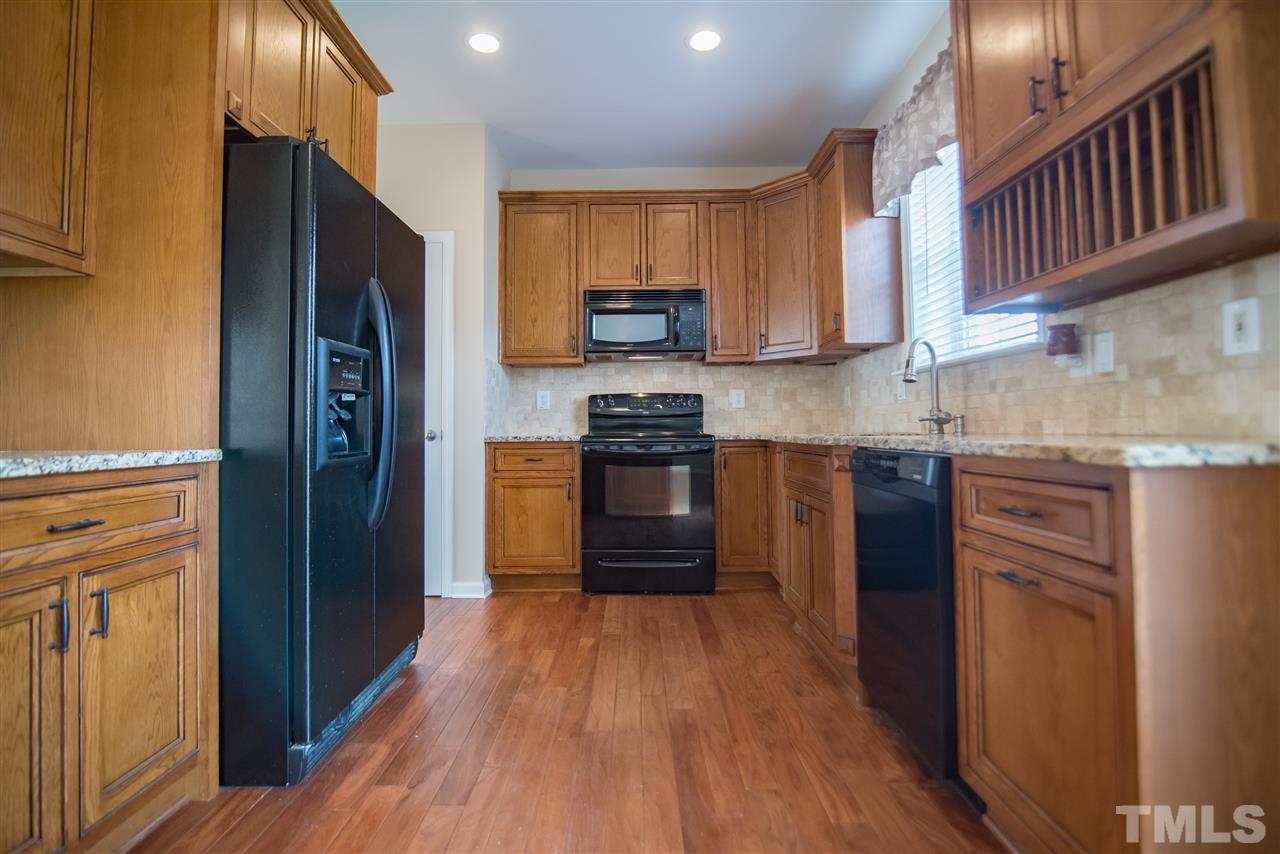 5525 Keowee Way Raleigh, NC 27616 - Photo 7 of 23 Look at all of that cabinet storage and counter space!