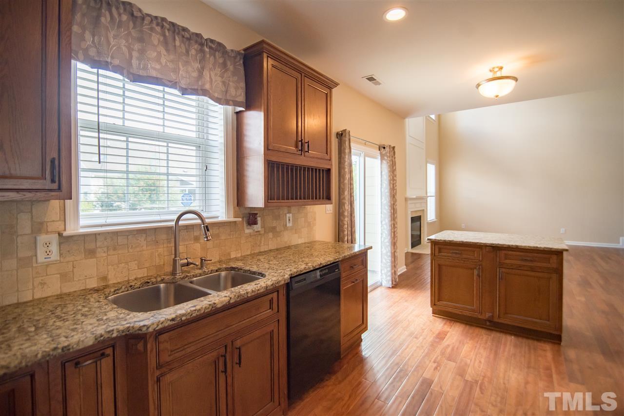 5525 Keowee Way Raleigh, NC 27616 - Photo 10 of 23 The double sink is not only convenient, but with those nice views of the back yard, you may not mind doing the dishes!