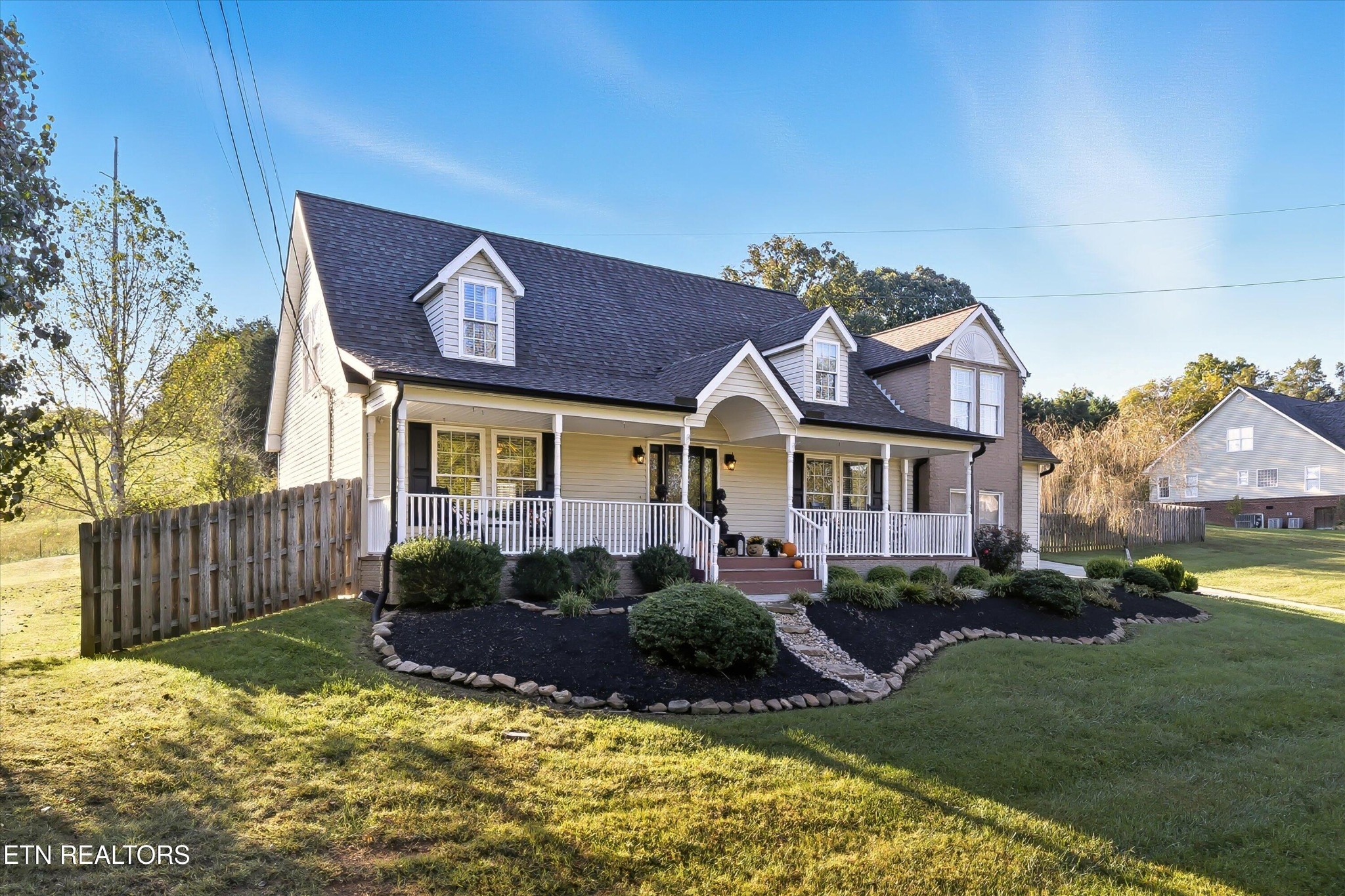 144 Huntington Lane Heiskell, TN 37754 - Photo 3 of 35 a front view of a house with a yard