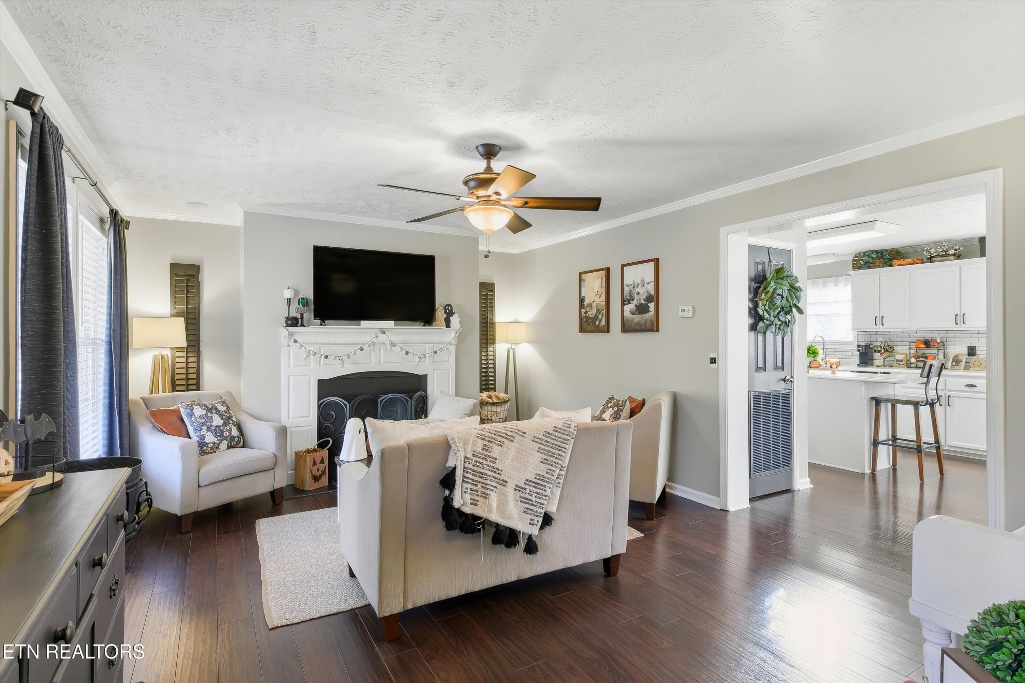144 Huntington Lane Heiskell, TN 37754 - Photo 7 of 35 a living room with furniture fireplace and a flat screen tv