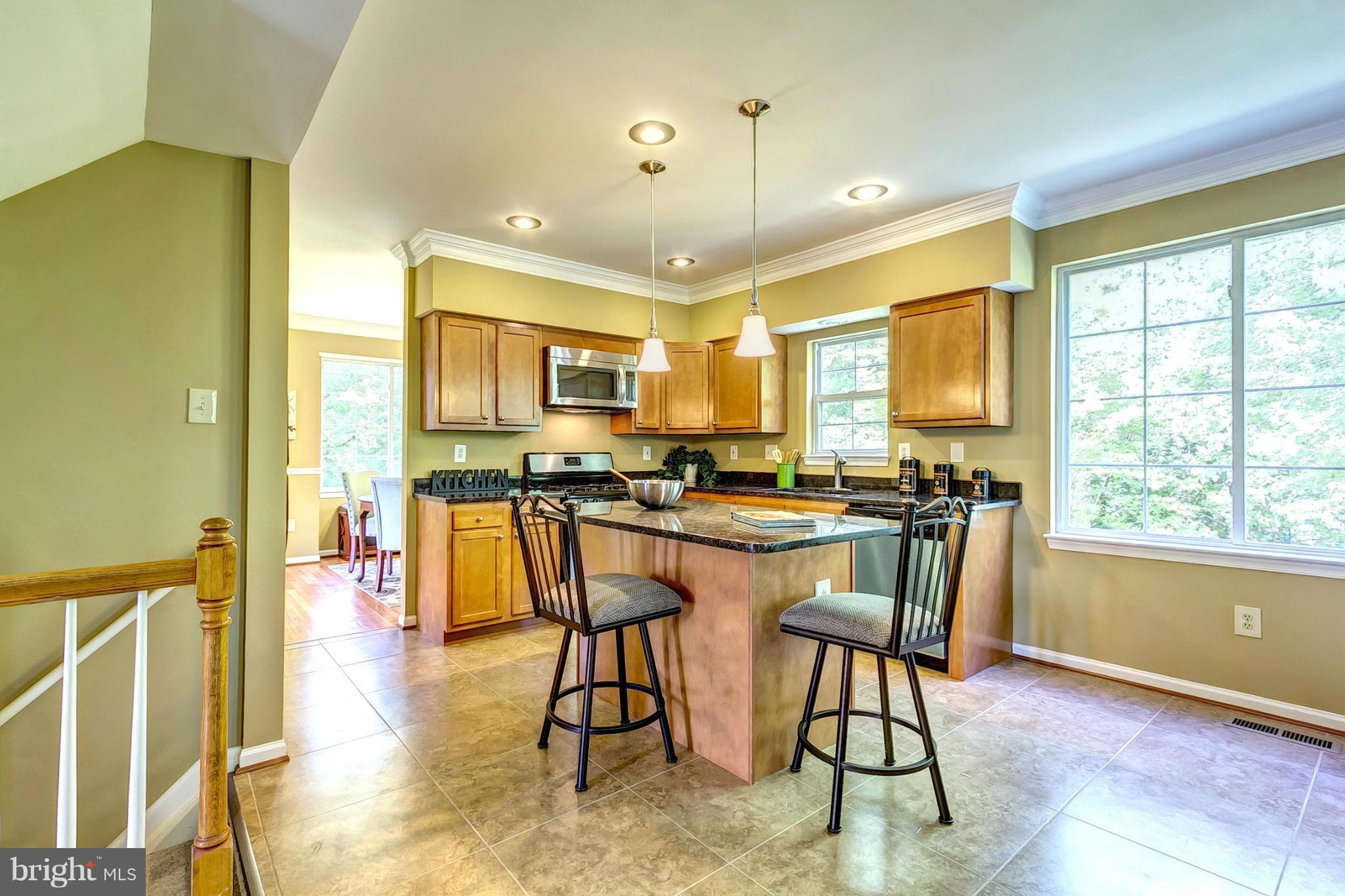 8 Clayfield Court Rosedale, MD 21237 - Photo 8 of 30 Kitchen With Breakfast Bar