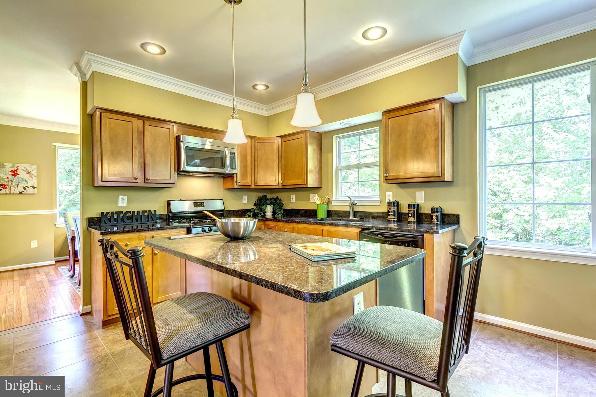 8 Clayfield Court Rosedale, MD 21237 - Photo 9 of 30 Granite Counters and Breakfast Bar