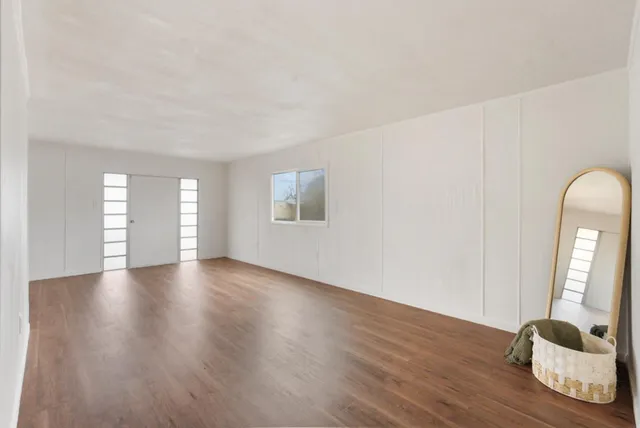 a view of livingroom with hardwood floor and window