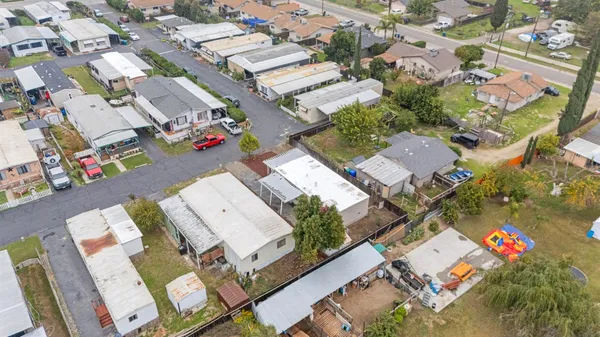 an aerial view of a house with a outdoor space