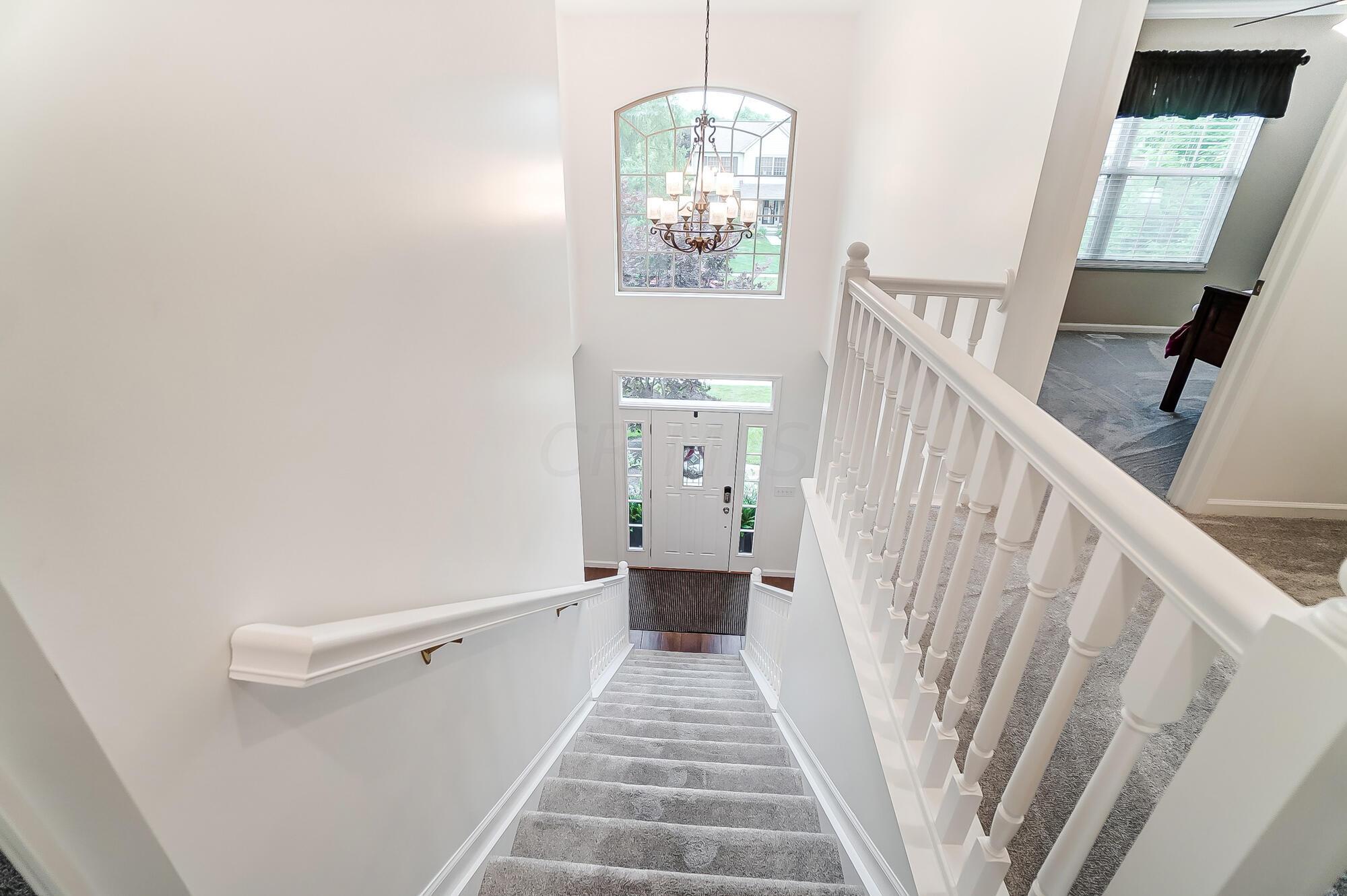 5674 Steward Road Galena, OH 43021 - Photo 13 of 82 Entryway staircase