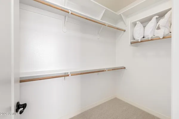 a view of a patio with chair and tables